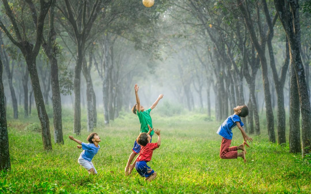 Kids playing in a field
